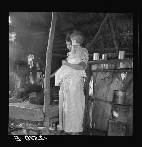 Untitled photo, possibly related to: Wife and child of Jibaro tobacco worker near Cidra, Puerto Rico