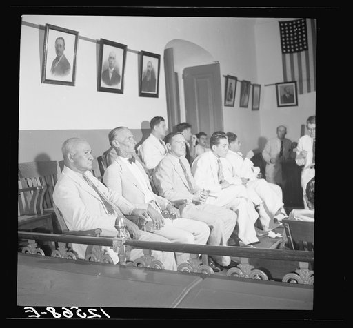 Untitled photo, possibly related to: The jury during the trial of Nationalists. Note three empty chairs. Ponce, Puerto Rico