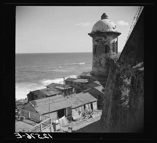 Untitled photo, possibly related to: View of a portion of the workers' quarter of La Perla from the old Spanish ramparts. San Juan, Puerto Rico