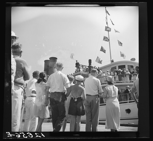 Untitled photo, possibly related to: Tourists getting aboard the "Steel Pier" on their return trip to Boston. During the season two boats arrive daily at two and leave about four, bringing and taking hundreds. Provincetown, Massachusetts
