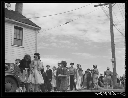 Untitled photo, possibly related to: Tourists, fresh off the boat from Boston. With only two hours in town, they buy seashells, dinners, trinkets, and rides on the sightseeing bus. Provincetown, Massachusetts