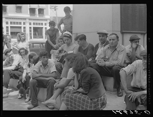 Untitled photo, possibly related to: Local talent makes music on a Sunday afternoon under the soldiers' monument. Provincetown, Massachusetts