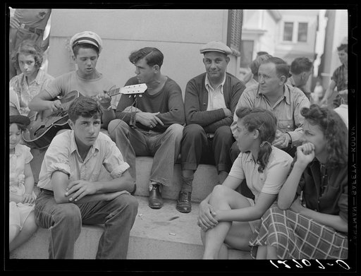Untitled photo, possibly related to: Local talent makes music on a Sunday afternoon under the soldiers' monument. Provincetown, Massachusetts