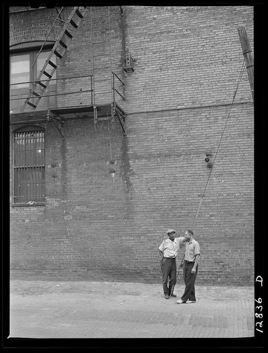 Untitled negative showing a street scene with two men, Washington, D.C.