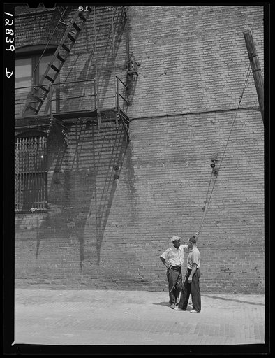 Untitled negative showing a street scene with two men, Washington, D.C.