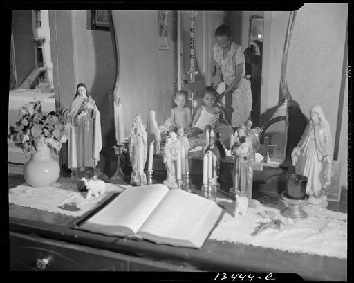 Untitled photo, possibly related to: Washington, D.C. Religious objects and an improved altar in the bedroom of Mrs. Watson, a government charwoman