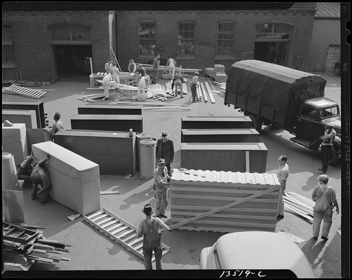 Untitled photo, possibly related to: Washington, D.C. United States government workers and carpenters making crates for steel cabinets and preparing them for shipment in the rear of the Auditor's Building at 14th Street and Independence Avenue