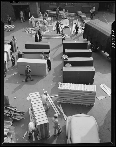 Untitled photo, possibly related to: Washington, D.C. United States government workers and carpenters making crates for steel cabinets and preparing them for shipment in the rear of the Auditor's Building at 14th Street and Independence Avenue