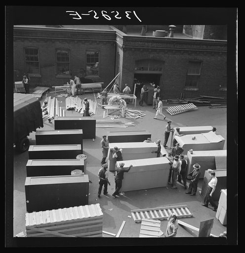 Untitled photo, possibly related to: Washington, D.C. United States government workers and carpenters making crates for steel cabinets and preparing them for shipment in the rear of the Auditor's Building at 14th Street and Independence Avenue
