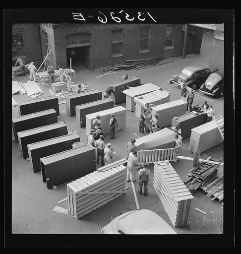 Untitled photo, possibly related to: Washington, D.C. United States government workers and carpenters making crates for steel cabinets and preparing them for shipment in the rear of the Auditor's Building at 14th Street and Independence Avenue