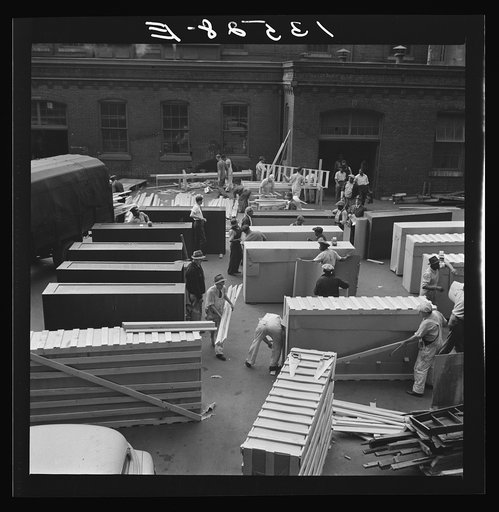 Untitled photo, possibly related to: Washington, D.C. United States government workers and carpenters making crates for steel cabinets and preparing them for shipment in the rear of the Auditor's Building at 14th Street and Independence Avenue