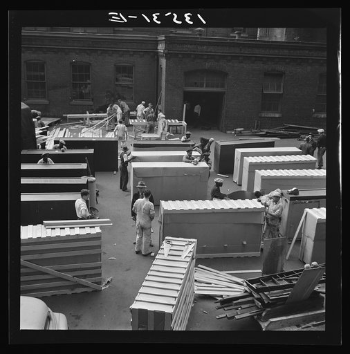 Untitled photo, possibly related to: Washington, D.C. United States government workers and carpenters making crates for steel cabinets and preparing them for shipment in the rear of the Auditor's Building at 14th Street and Independence Avenue