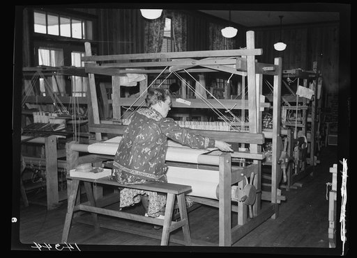 Ashwood plantation, Bishopville, South Carolina. A woman weaving drapery material at the Ashwood weaving laboratory.