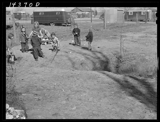 Untitled photo, possibly related to: Children of defense workers playing in "their backyards." Trailer camp, Mount Vernon Highway, Alexandria, Virginia