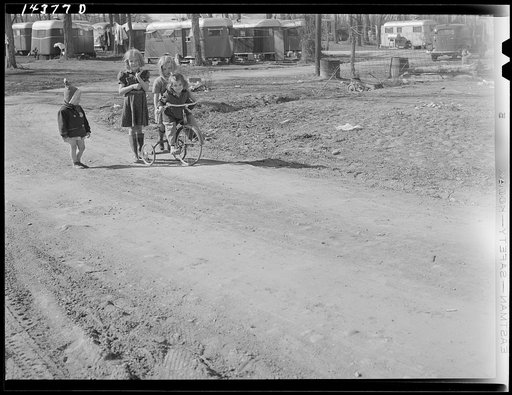 Untitled photo, possibly related to: Children of defense workers playing in "their backyards." Trailer camp, Mount Vernon Highway, Alexandria, Virginia