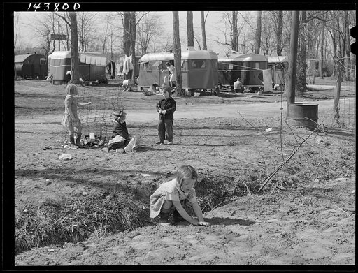 Untitled photo, possibly related to: Children of defense workers playing near their "homes" trailers. Trailer camp on Mount Vernon Highway near Alexandria, Virginia