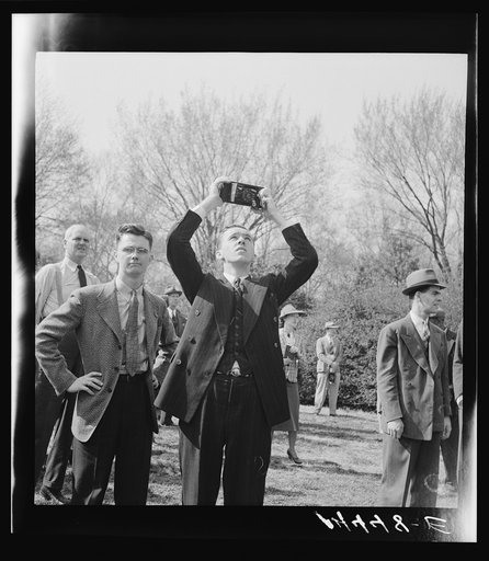 Untitled photo, possibly related to: Camera bugs snapping the cherry blossoms across the Tidal Basin. Cherry Blossom Festival, Washington, D.C.