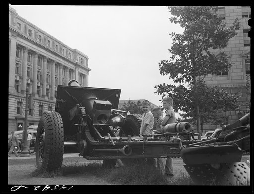 Untitled photo, possibly related to: Children at National Defense exhibit on Commerce Square. Washington, D.C.