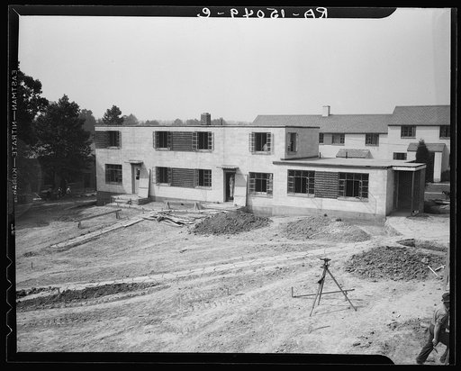 Untitled photo, possibly related to: Completed two-family, brick-veneer house at Greenbelt, Maryland