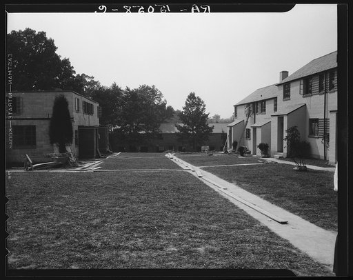 Untitled photo, possibly related to: Row house nearing completion at Greenbelt, Maryland