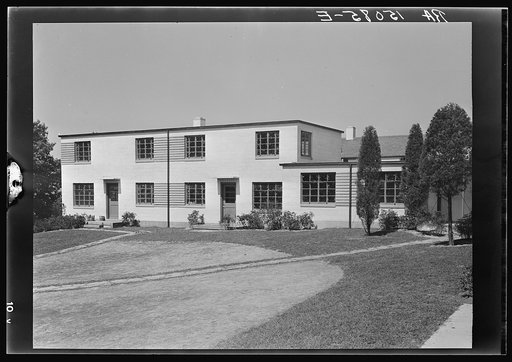 Completed two-family, brick-veneer house at Greenbelt, Maryland