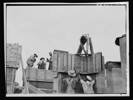 Rammed earth construction, near Birmingham. Form sections should not be larger than can be handled by a crew of three or four men. Alabama