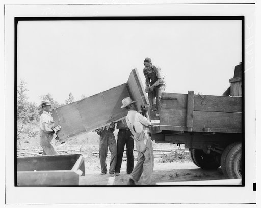 Rammed earth construction near Birmingham, Alabama. When one house has been completed the forms are moved to the next building site