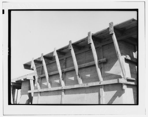 Rammed earth construction near Birmingham, Alabama. Concrete slate roofs may be used in place of wood decks