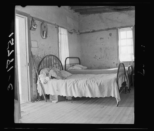 In this single-room house on these two beds sleep the mother, three sisters and the brothers (six altogether). Great Western Sugar Company's beet sugar workers' colony at Hudson, Colorado