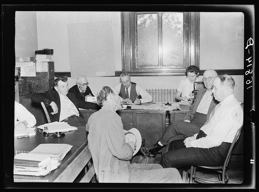 Farm Debt Adjustment Committee meeting with farmer who has appealed for assistance. He has been threatened with foreclosure and loss of farm. Ozark Mountain town of Harrison, Arkansas