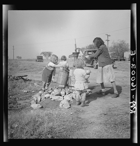 Water supply. Migratory camp for cotton pickers. San Joaquin Valley, California. American River camp