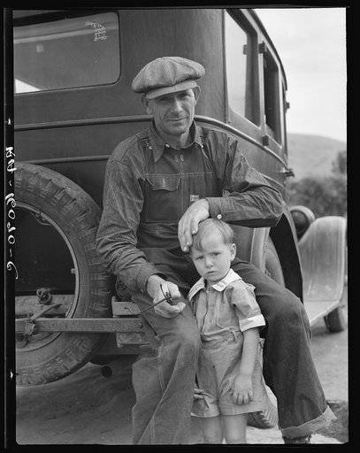 1936 drought refugee from Polk, Missouri. Awaiting the opening of orange picking season at Porterville, California