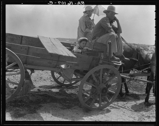 Drought-stricken farmer and family near Muskogee, Oklahoma. Agricultural day laborer. Muskogee County