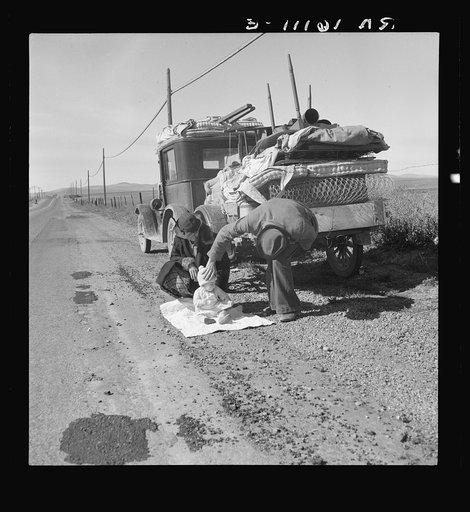 Missouri family of five, seven months from the drought area, on U.S. Highway 99 near Tracy, California