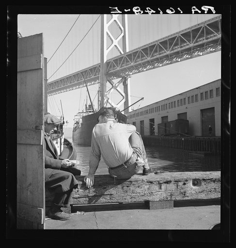 Longshoremen's lunch hour. San Francisco waterfront. California