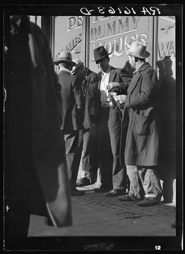 Unemployed men on Howard Street. San Francisco, California