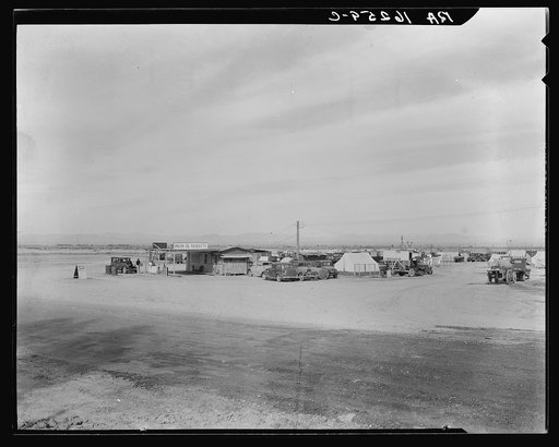 Auto camp north of Calipatria, California. Approximately eighty families from the Dust Bowl are camped here. They pay fifty cents a week. The only available work now is agricultural labor