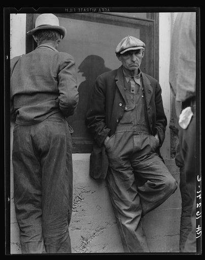 Waiting for the semimonthly relief checks at Calipatria, Imperial Valley, California. Typical story: fifteen years ago they owned farms in Oklahoma. Lost them through foreclosure when cotton prices fell after the war. Became tenants and sharecroppers. With the drought and dust they came West, 1934-1