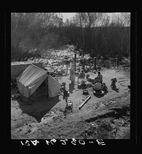 Drought refugees from Chickasaw, Oklahoma. Three families traveling together. They can't travel because of lack of money for trailer license. Near Santa Maria, California