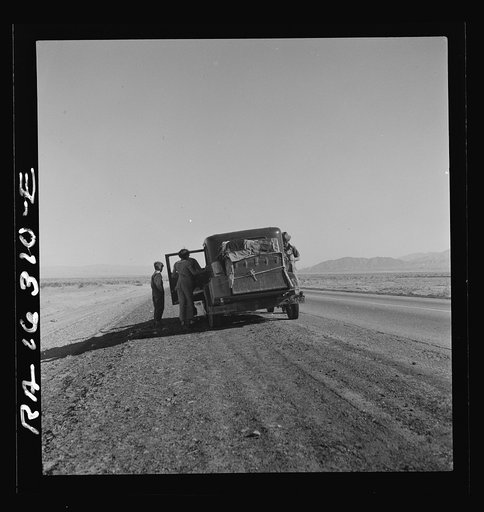 Oklahoma sharecropper entering California stalled on the desert with his wife and four children
