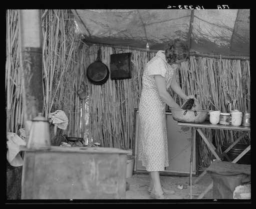 Drought refugee living in a ditch bank camp. Imperial County, California