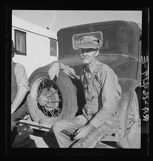 Texans and Oklahomans, drought stricken ex-farmers, are fast supplanting Mexican labor in the California harvests. Oklahoman from Chickasaw in potato pickers' camp. Kern County, California