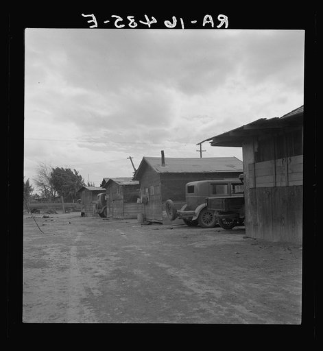 Slums of East El Centro, California. Housing for Mexican field workers. They rent for eight dollars a month. Imperial Valley