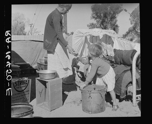 Drought refugees in migratory agricultural workers' camp. California