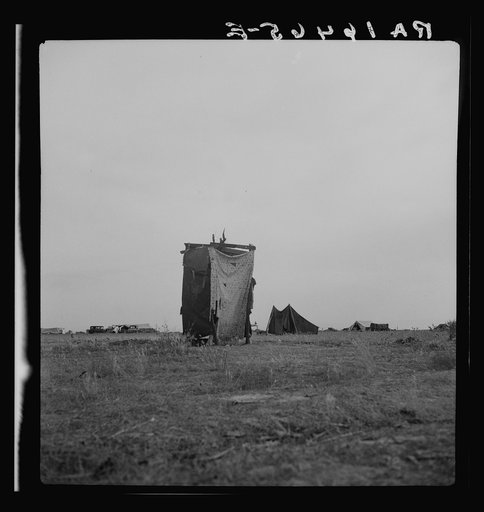 Unsanitary privy in potato pickers' camp near Shafter, California