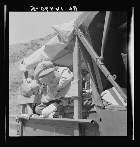 Drought refugee children on U.S. 99 near Bakersfield, California