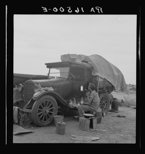 Potato picker in camp near Shafter, California
