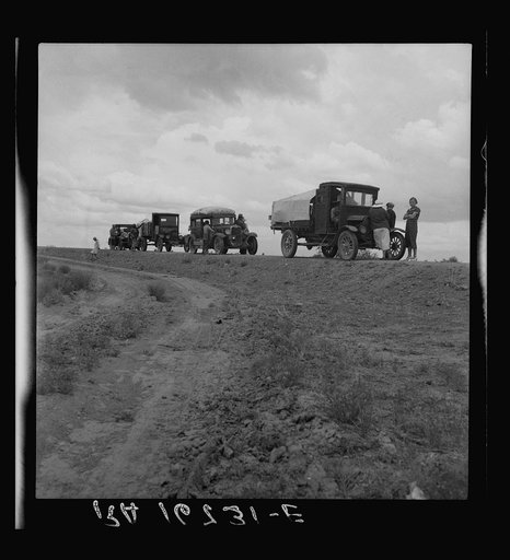 Drought refugee families from Oklahoma on road to Roswell, New Mexico, to chop cotton. Near Lordsburg, New Mexico