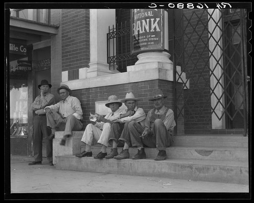 On the steps of the bank in the public square. Memphis, Texas