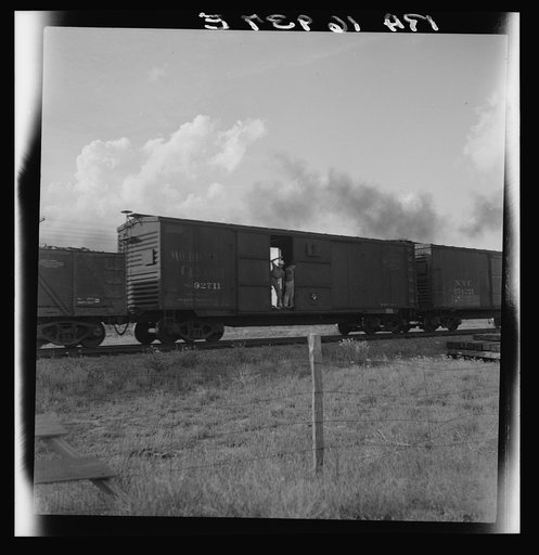 Boy riding freight. West Texas